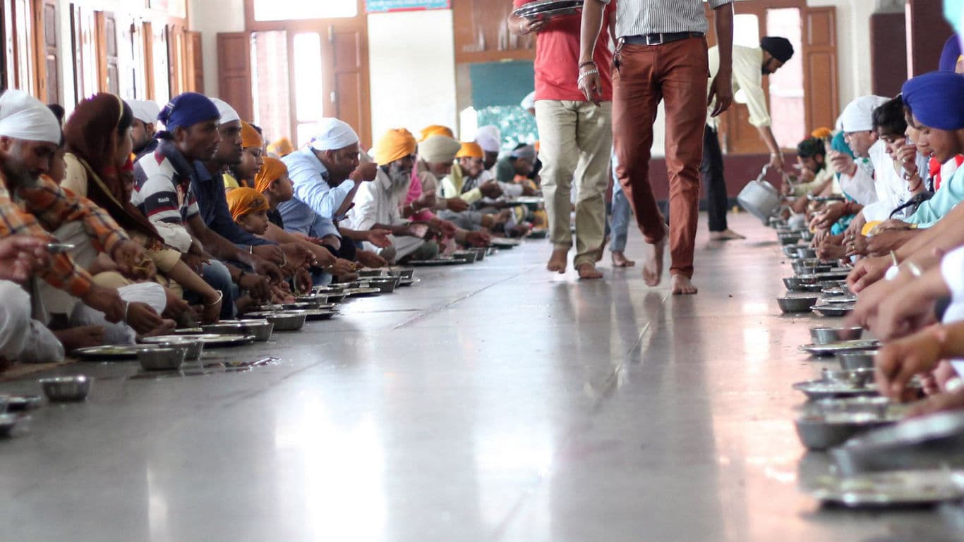 Community meal gathering in large hall