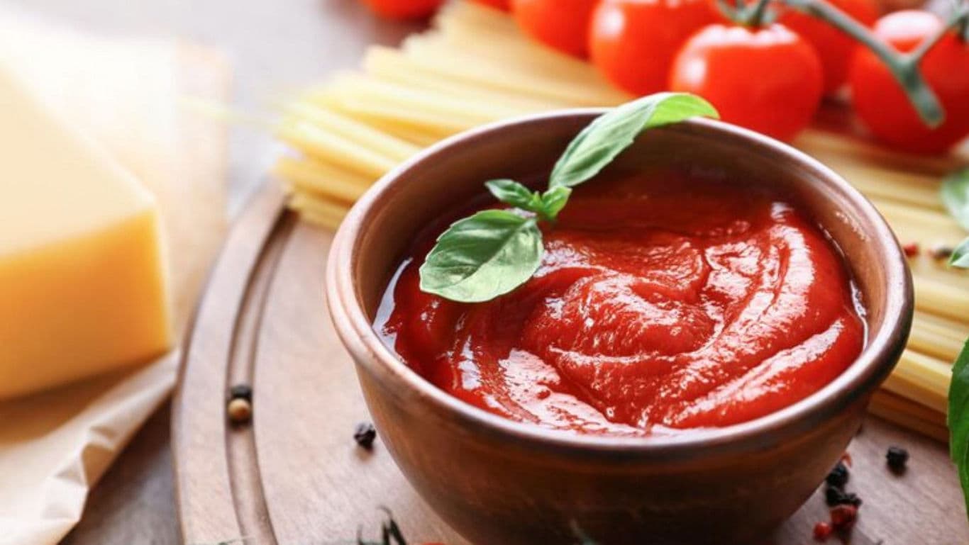 Fresh tomato sauce in rustic ceramic bowl