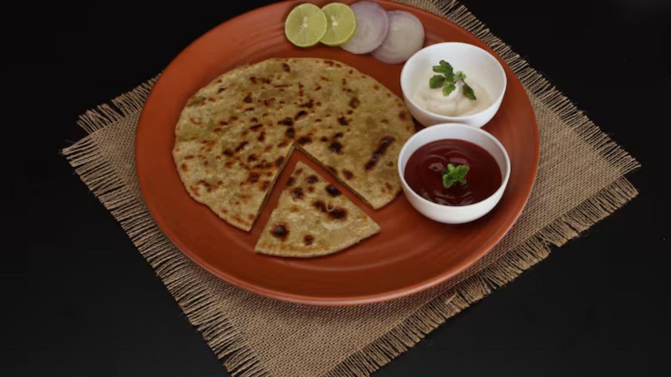 Indian flatbread with dips and garnishes