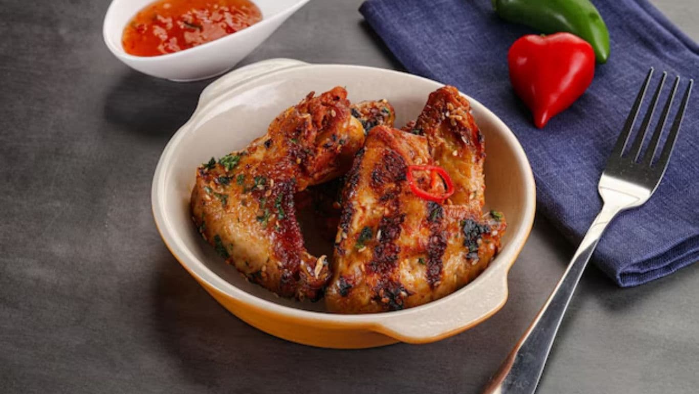 Grilled chicken wings with chili sauce