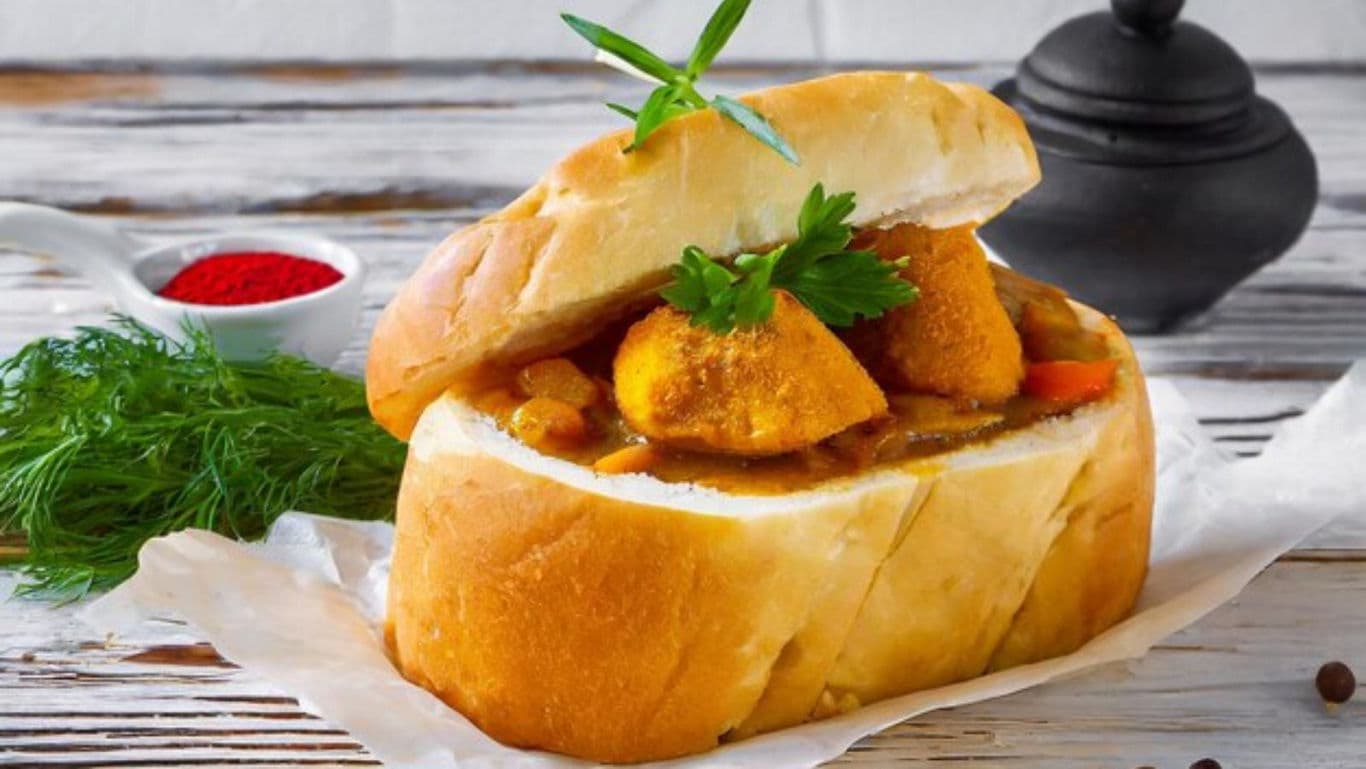 Bread bowl with curry and herbs