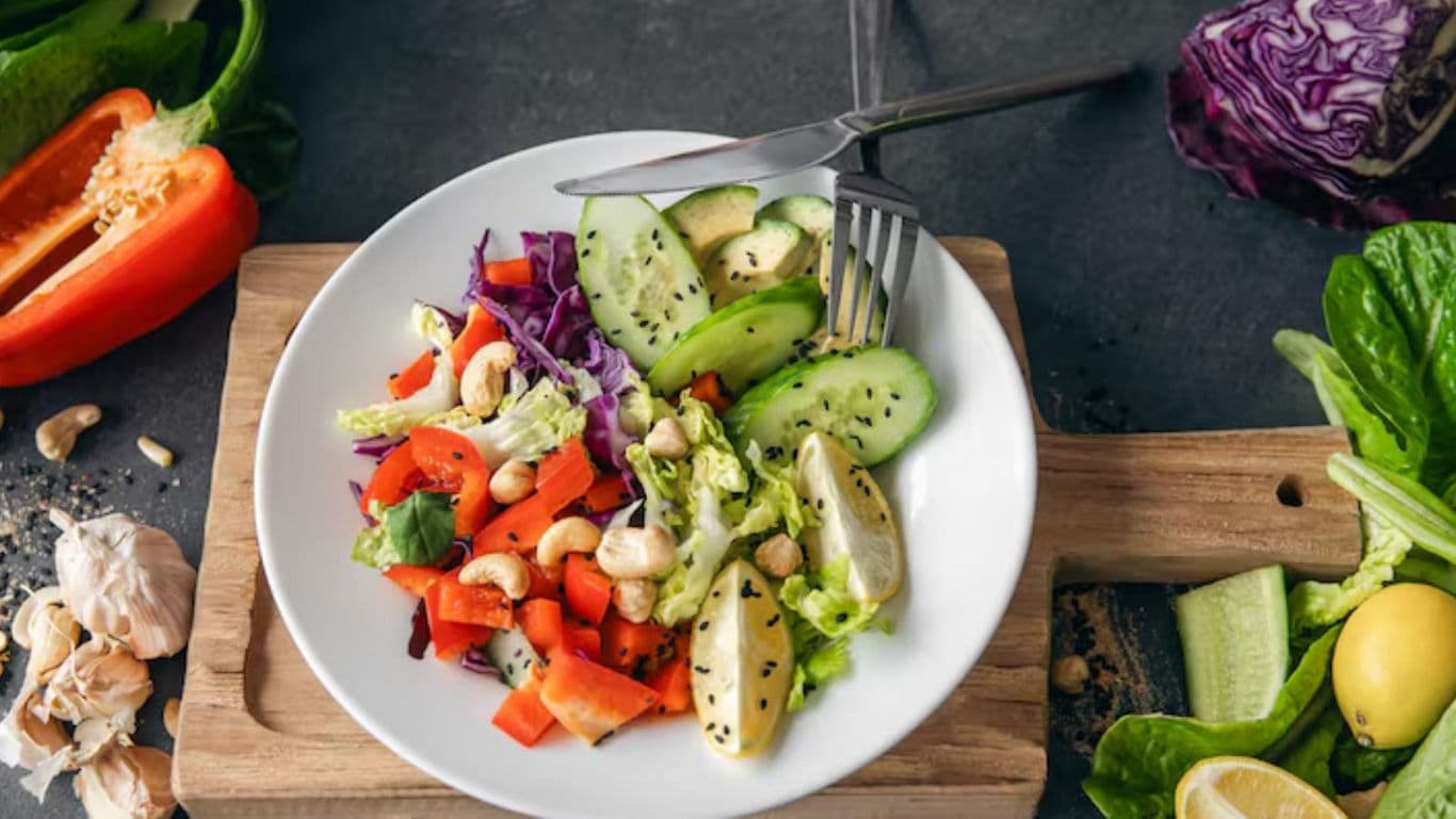 Fresh vegetable salad with avocado and nuts