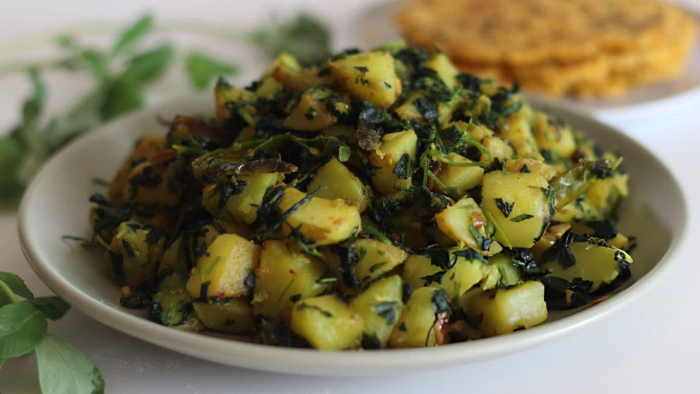 Spiced Potato and Greens Dish on Plate