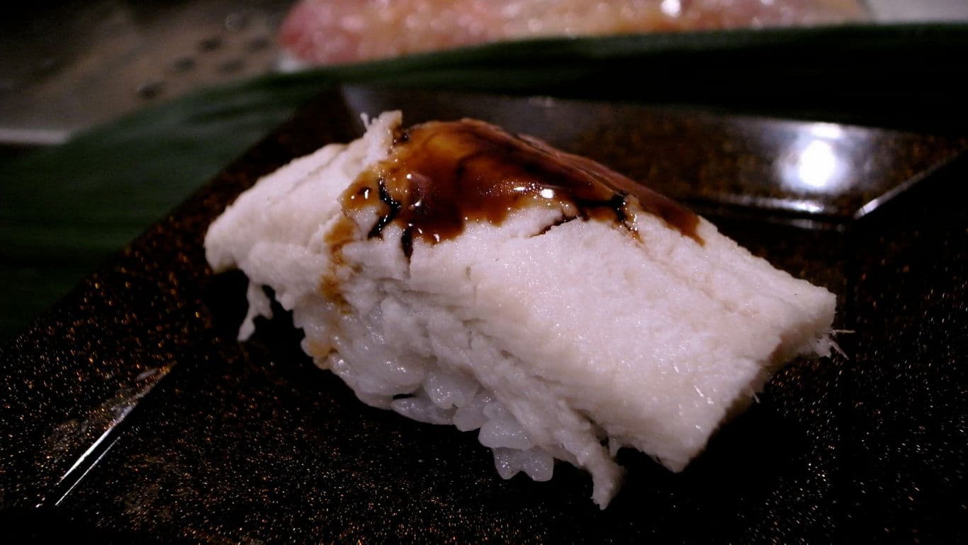 Close-up of sushi with sauce