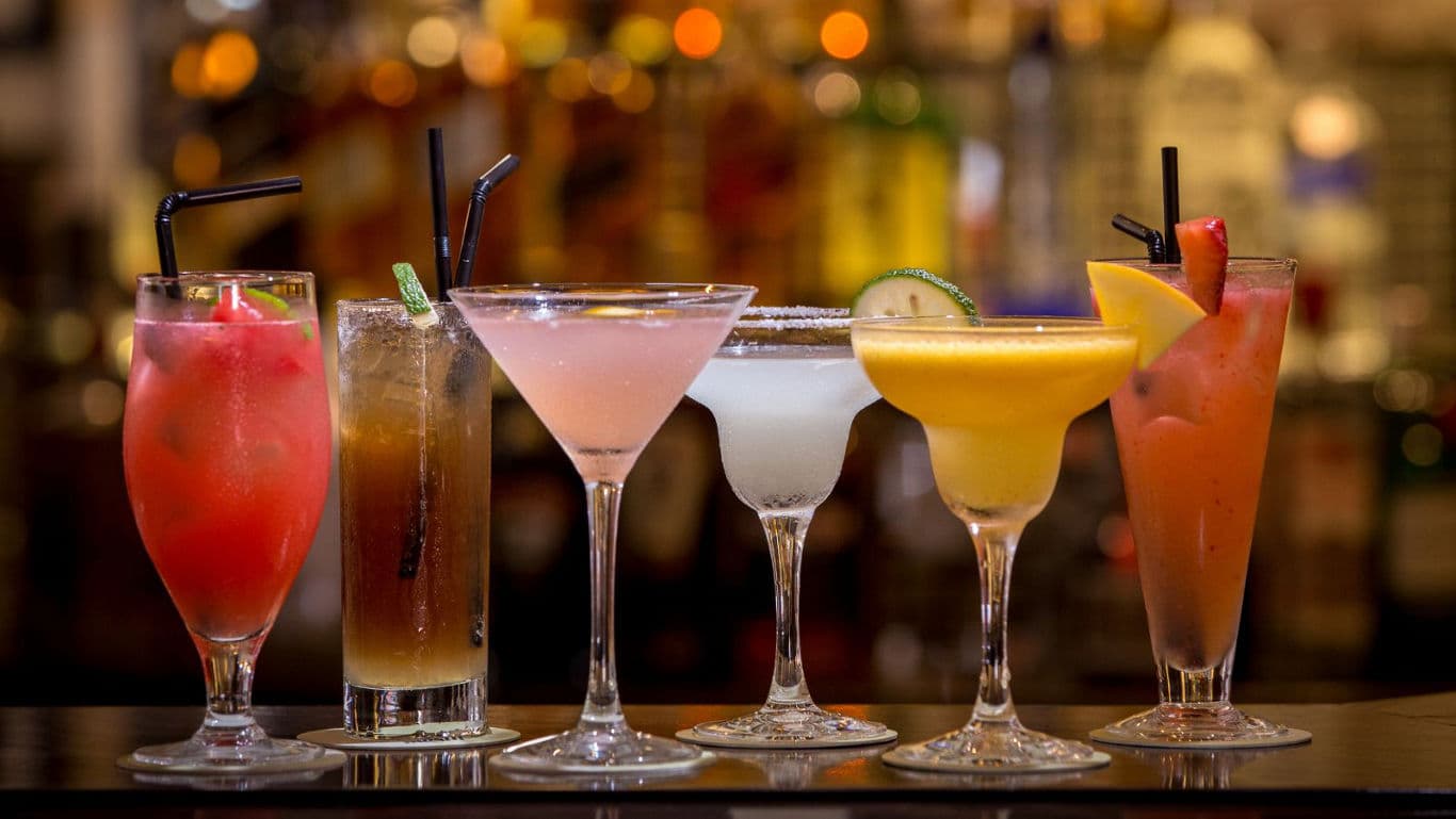 Assorted colorful cocktails in elegant glasses