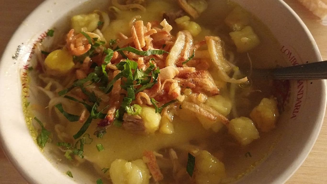 Warm bowl of hearty chicken soup