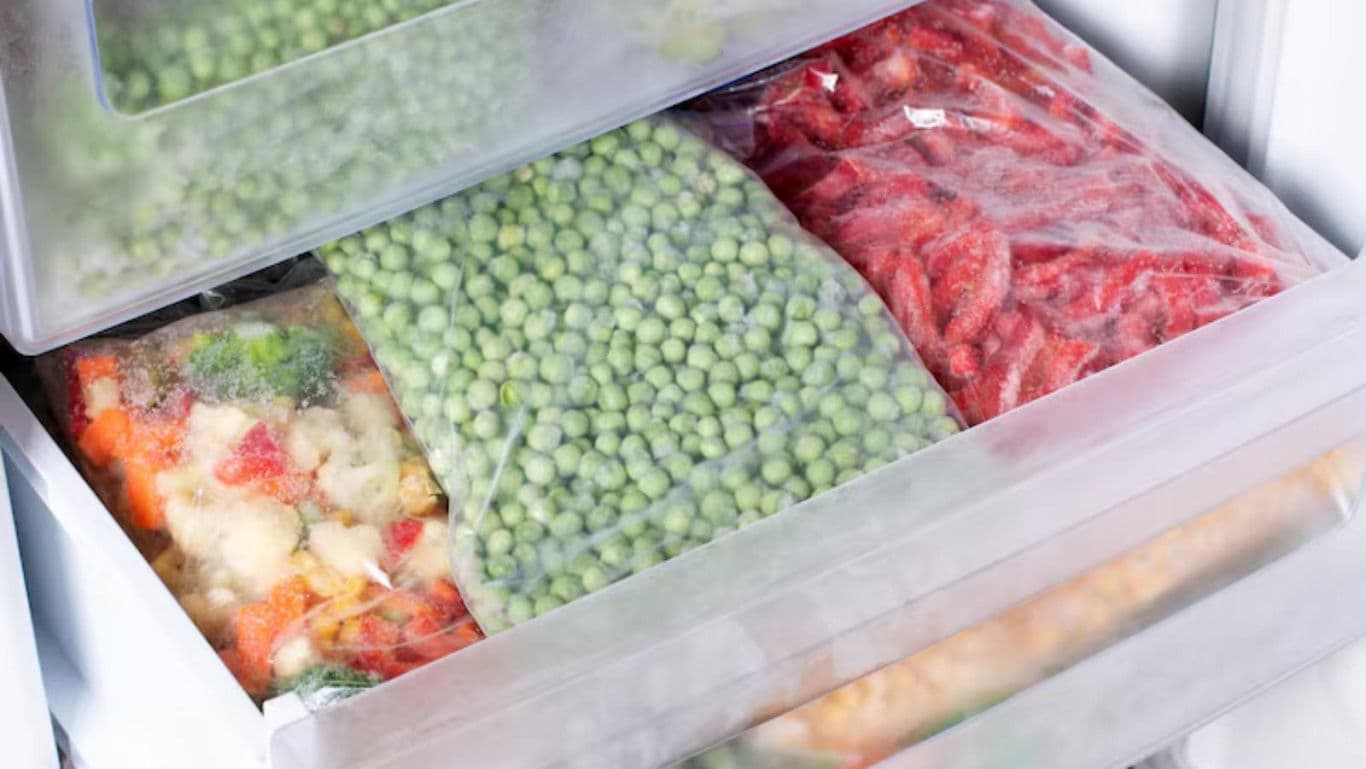 Frozen vegetables and fruits in freezer