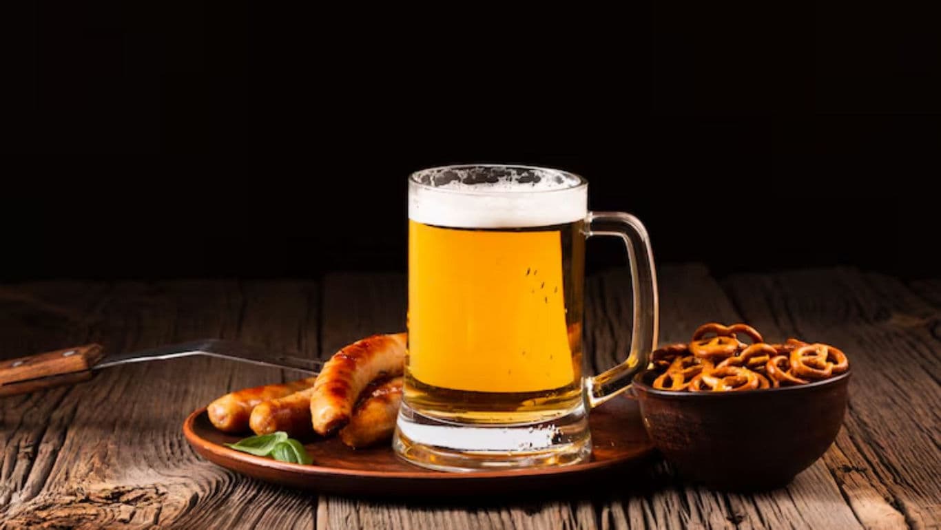 Mug of Beer with Sausages and Pretzels