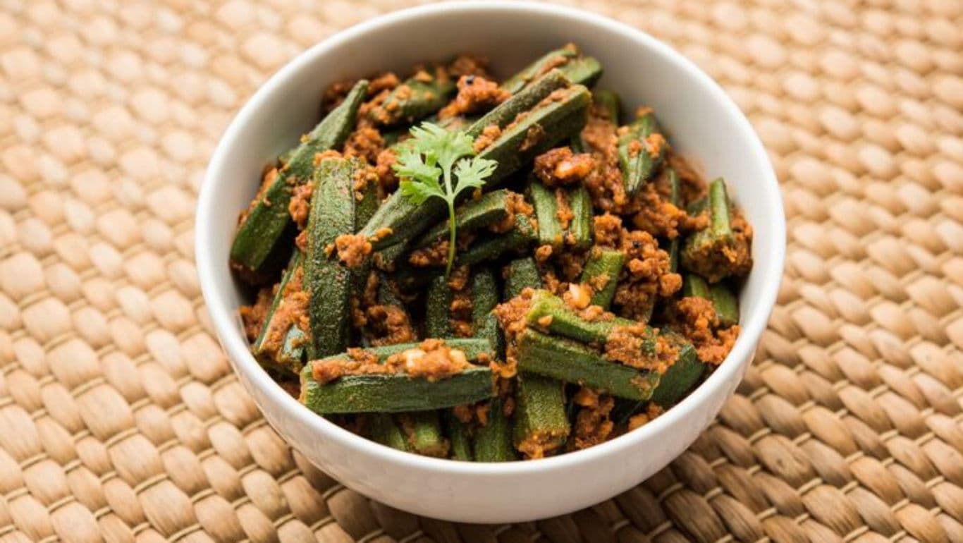 Spiced okra dish in white bowl