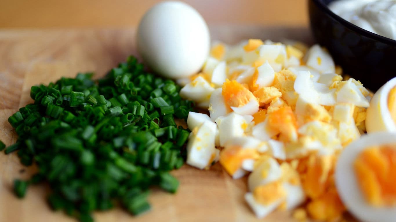 Boiled, scrambled and poached eggs for breakfast