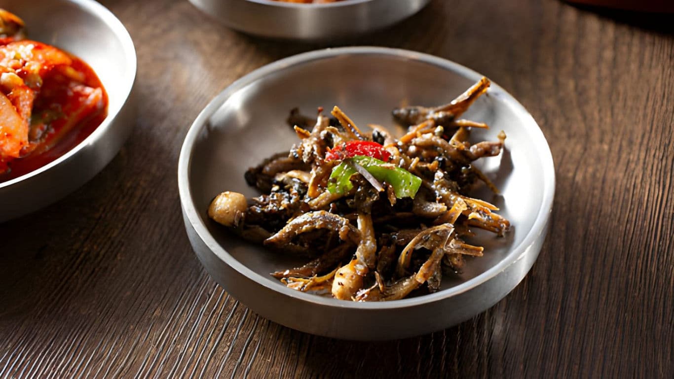 Stir-fried anchovies in metal bowl