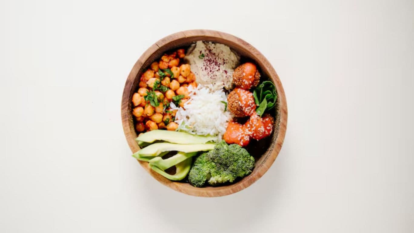 Colorful vegan Buddha bowl with fresh vegetables
