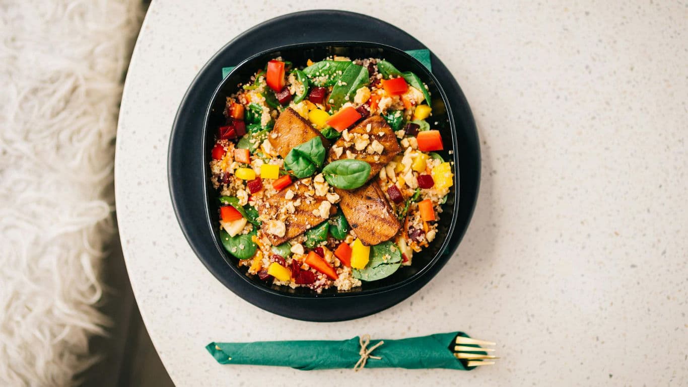 Colorful Grilled Chicken Salad on Round Table
