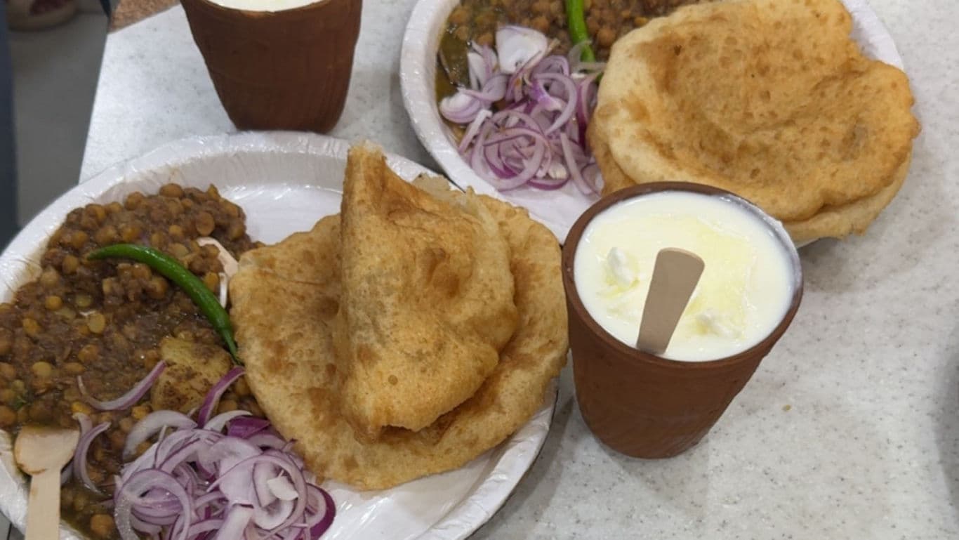 Traditional Indian meal with lassi served