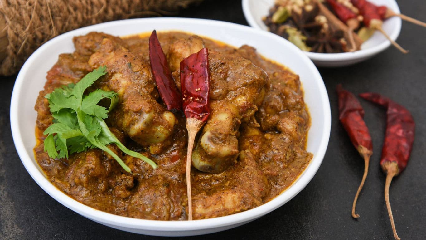 Spicy chicken curry with red chilies