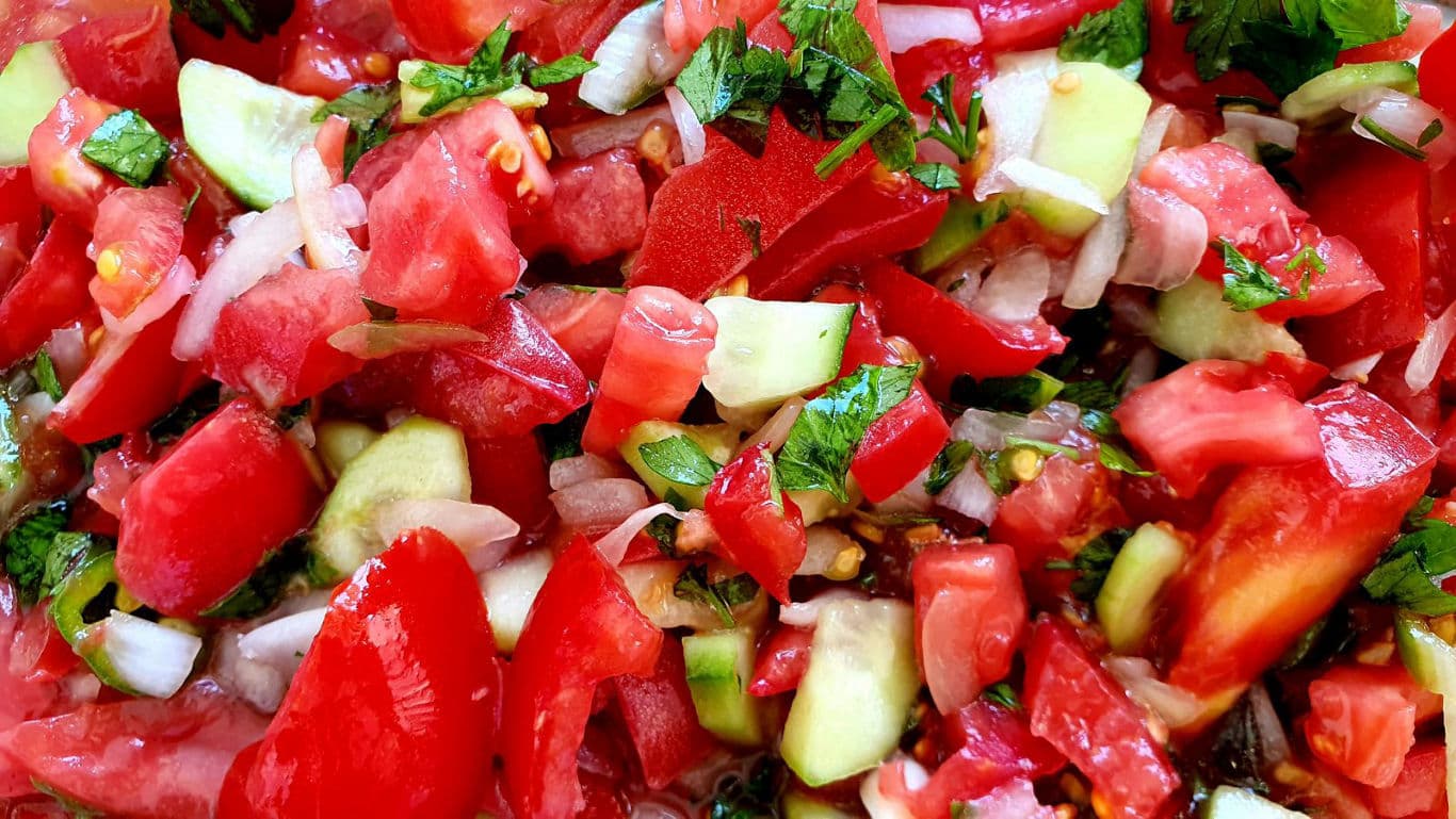 Fresh vegetable salad with tomatoes and cucumbers