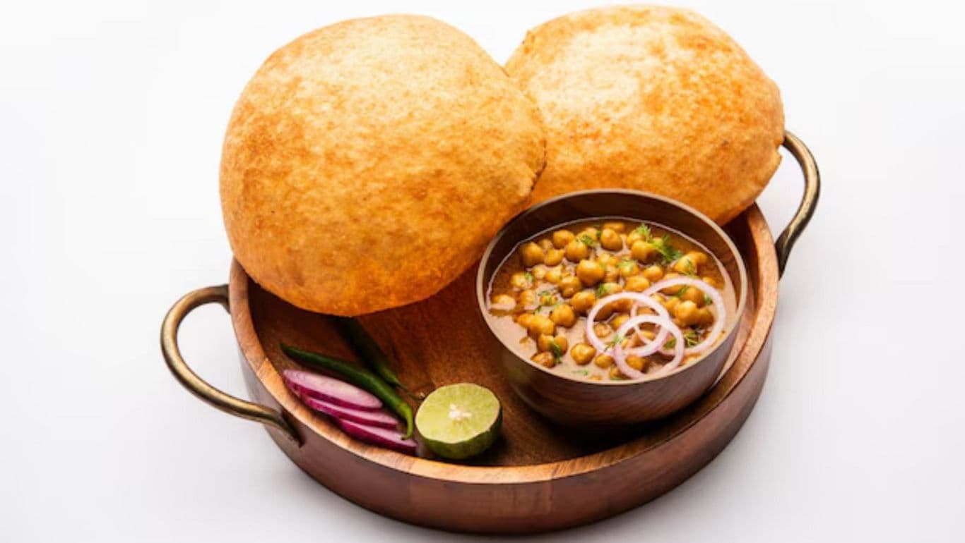 Traditional Indian chole bhature meal served