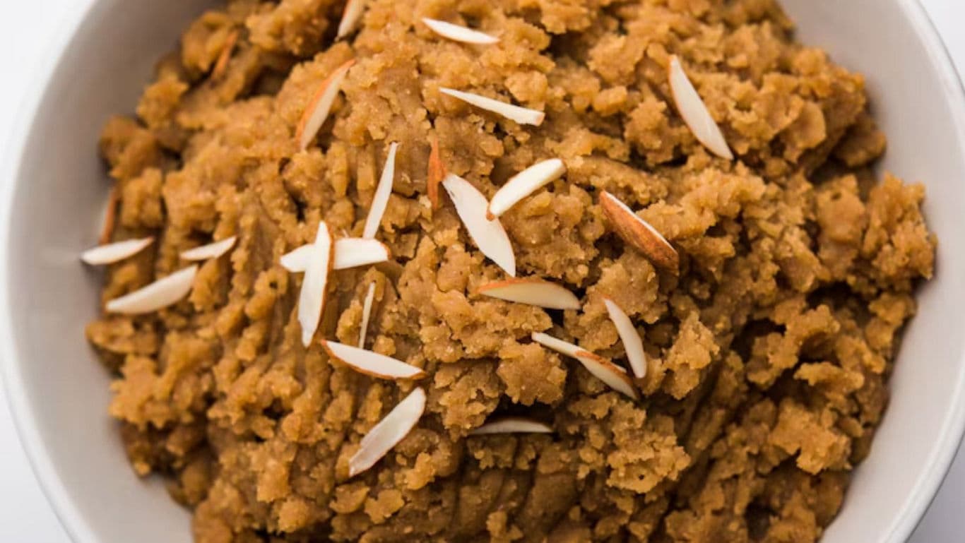 Traditional Indian dessert with almond garnish