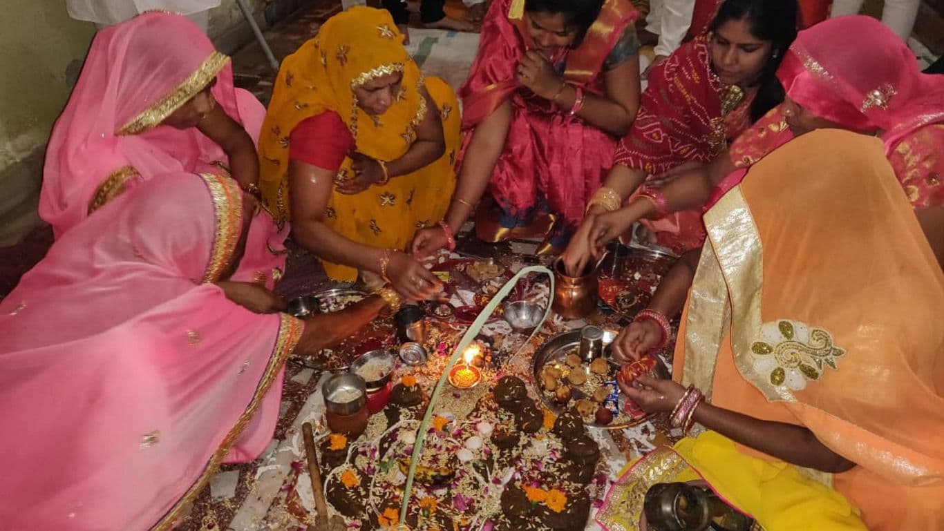 Traditional Indian women performing ritual ceremony