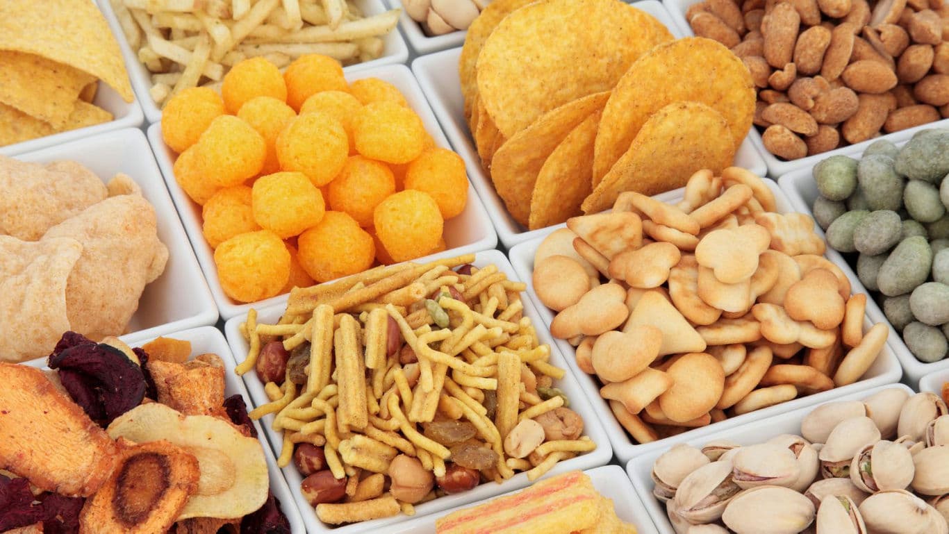 Assorted snack bowls with diverse treats