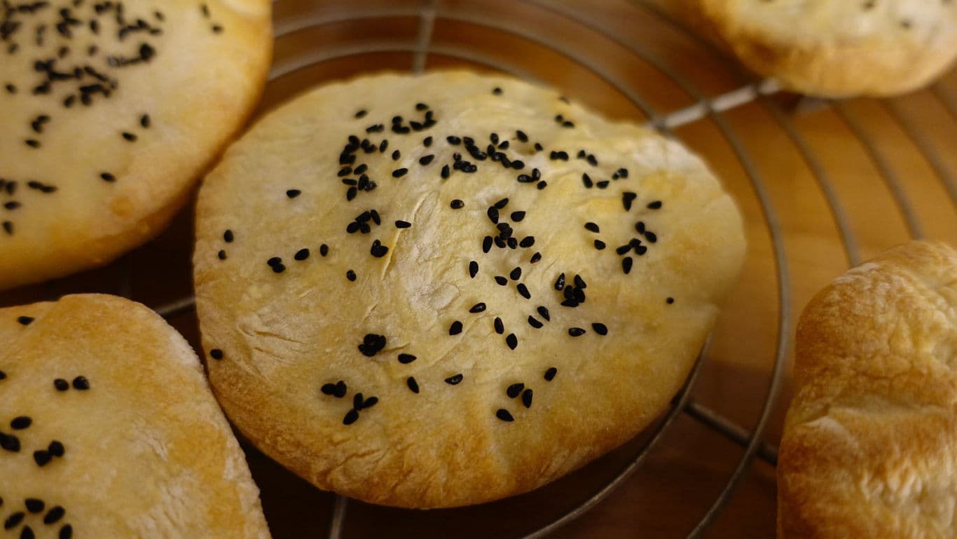 Freshly baked flatbread with sesame seeds