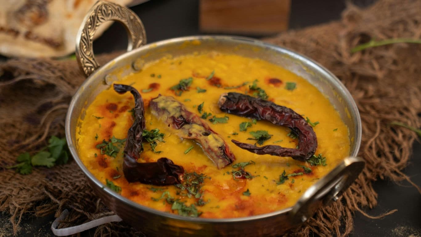 Spicy Lentil Curry in Traditional Bowl