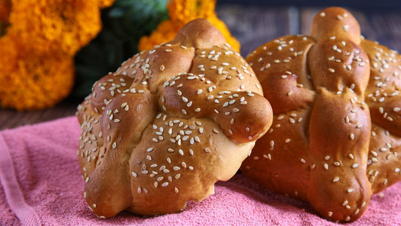Traditional Pan de Muerto with Sesame Seeds