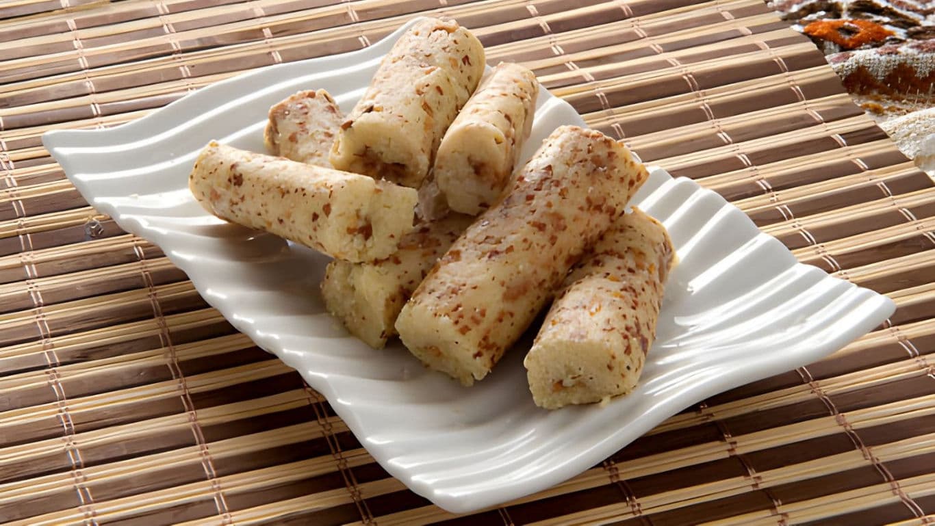 Rolled snacks on white plate