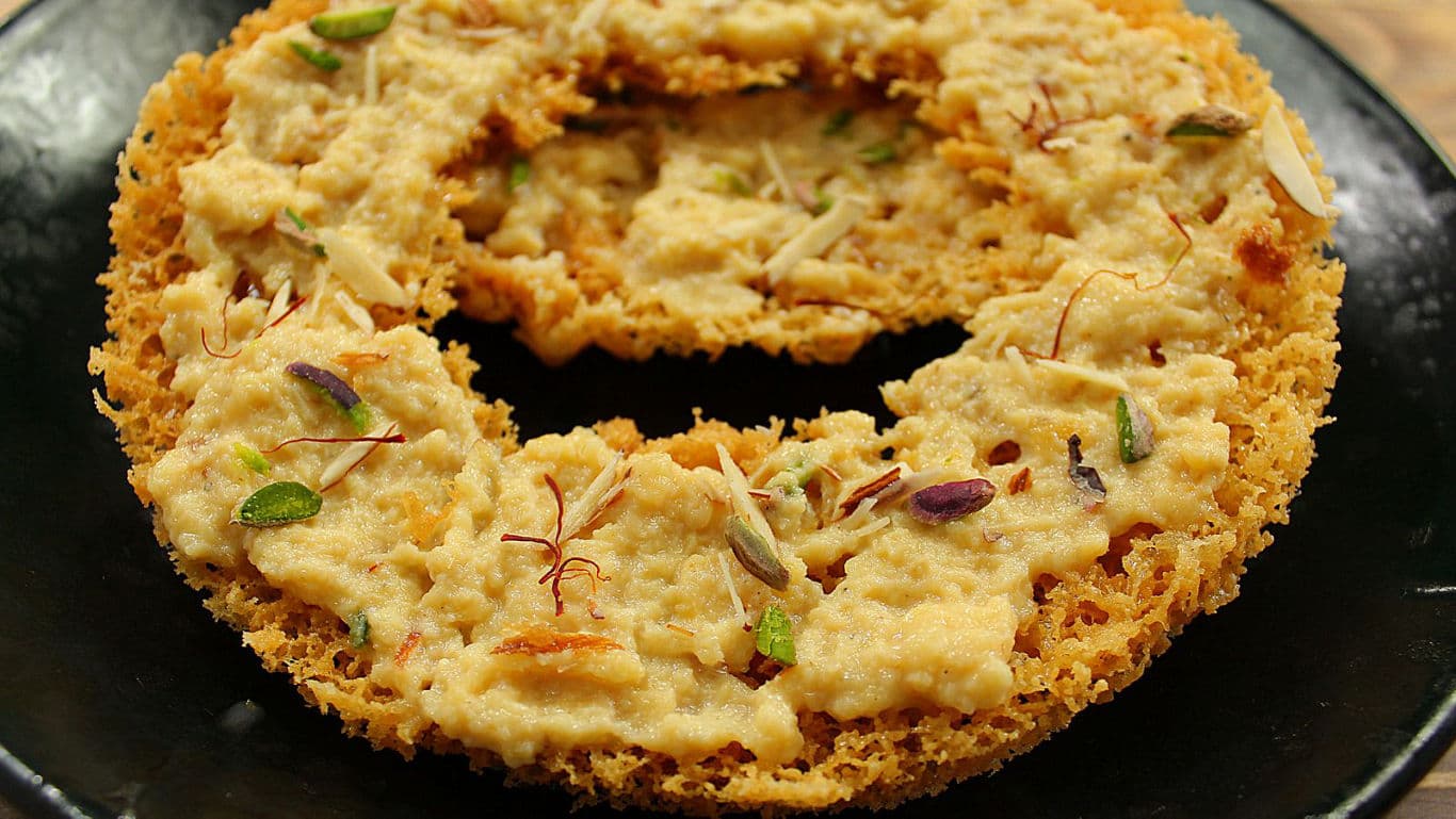 Traditional Indian dessert with nuts and saffron