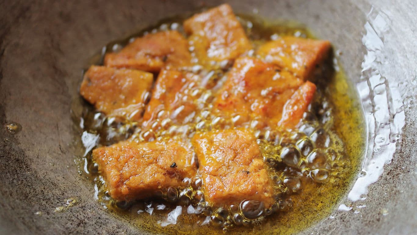 Golden fried tofu in hot oil