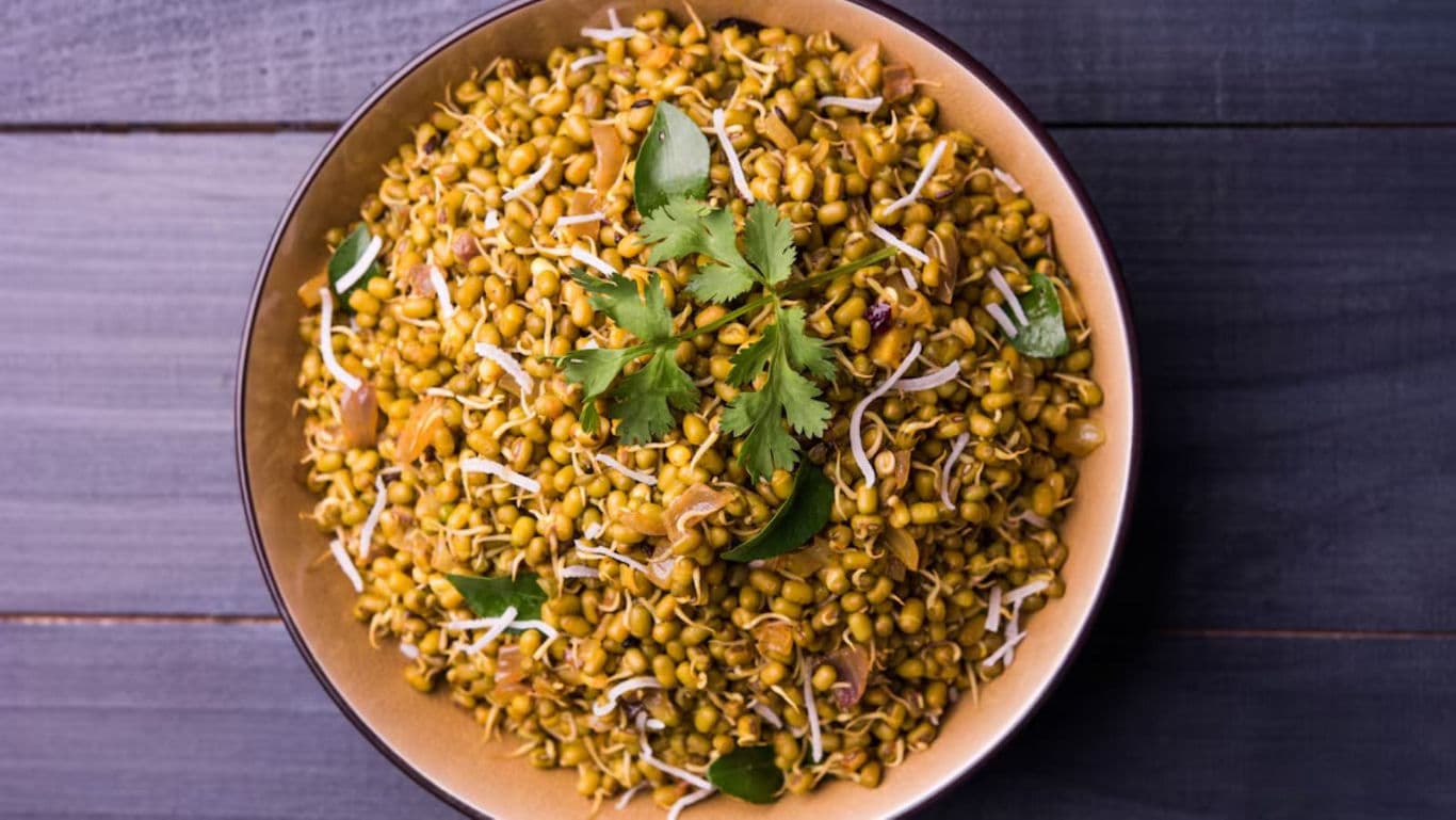 Bowl of sprouted lentil salad with garnish