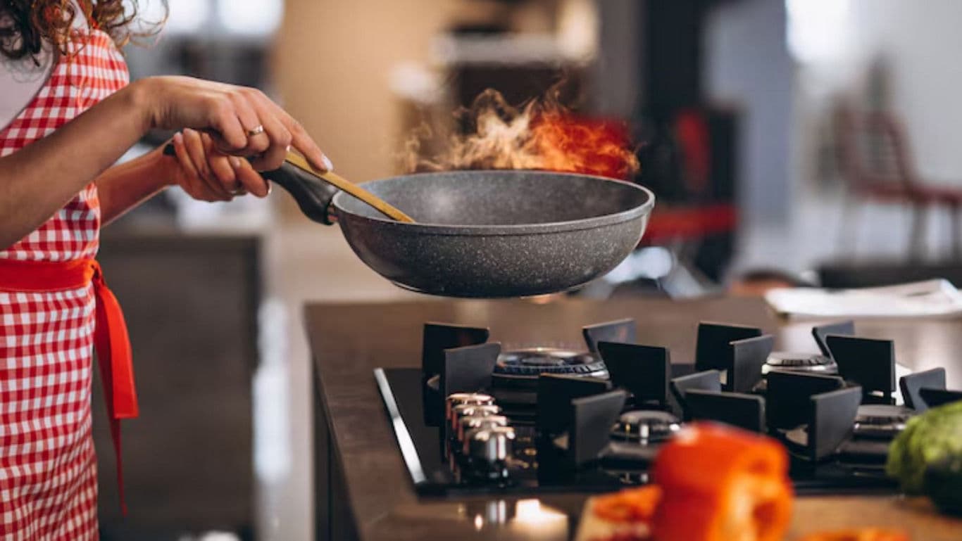Cooking on stovetop with frying pan