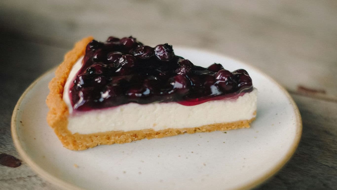 Slice of Blueberry Cheesecake on Plate
