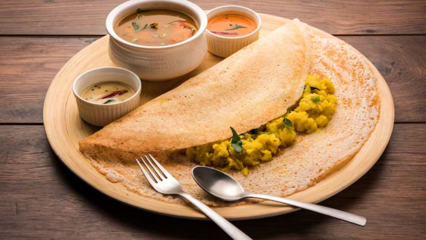 Traditional Indian dosa with chutneys