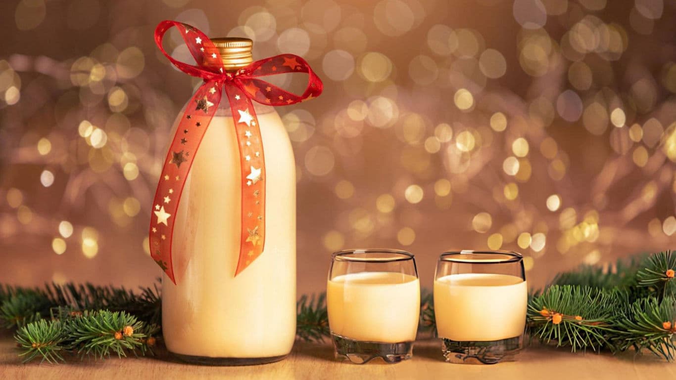 Festive eggnog bottle with holiday decor