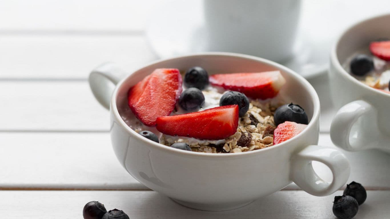 Healthy breakfast with berries and granola