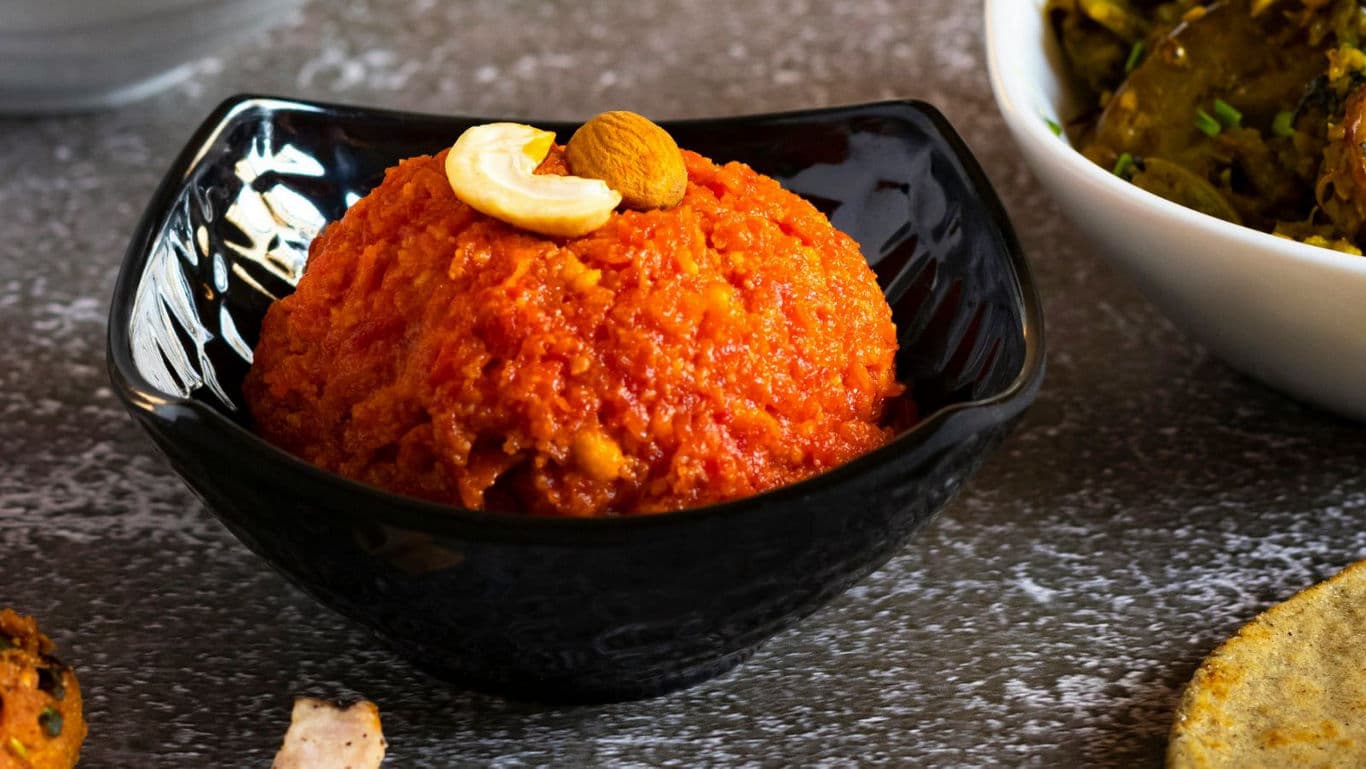Black bowl of Indian carrot halwa dessert
