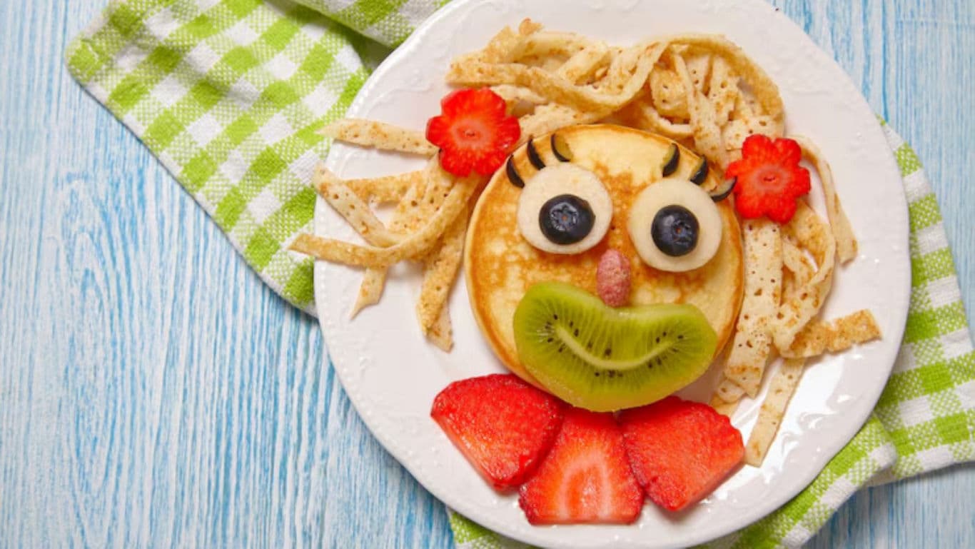 Plate of crepes with fresh strawberries