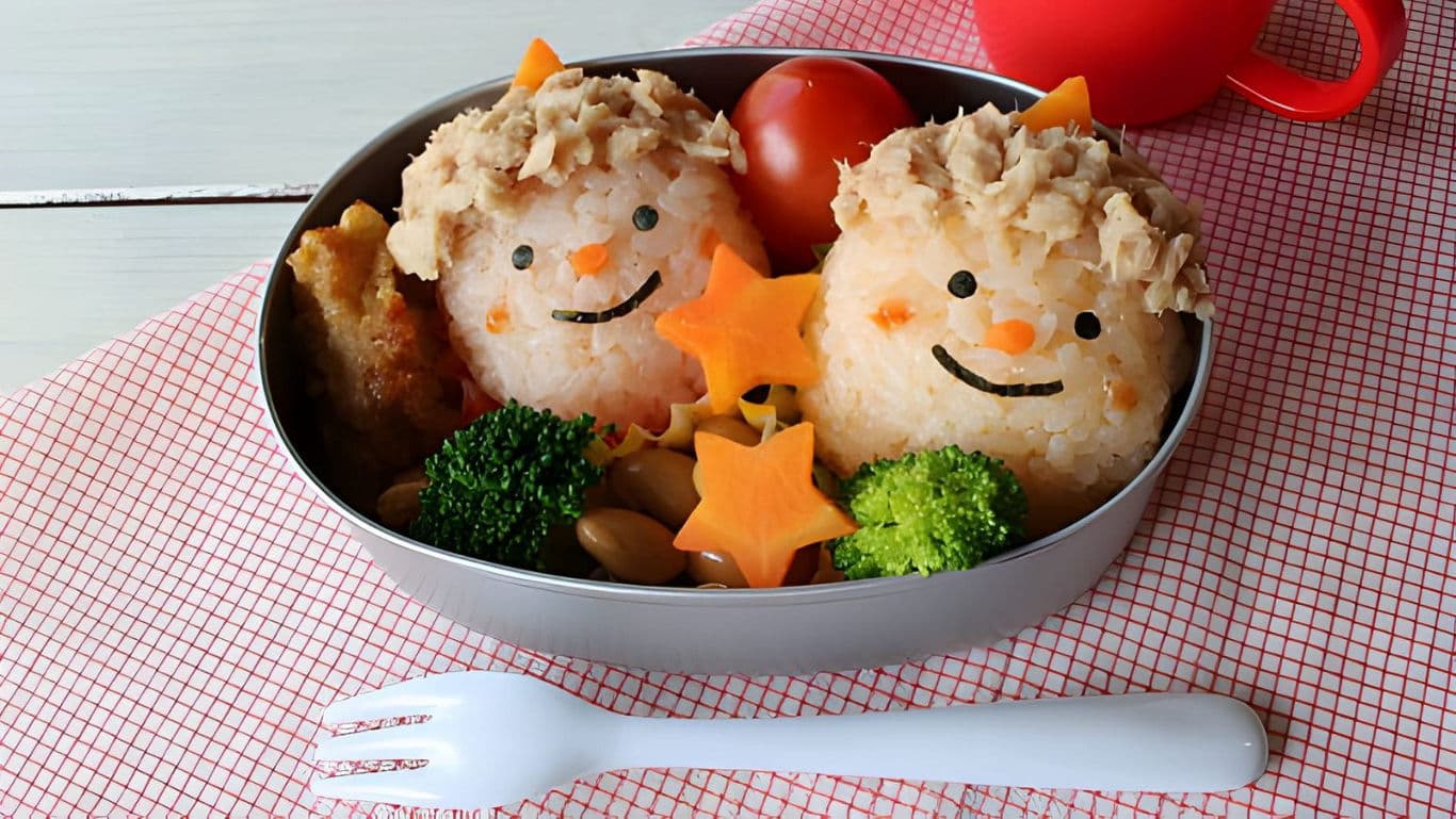 Cute bento box with rice characters