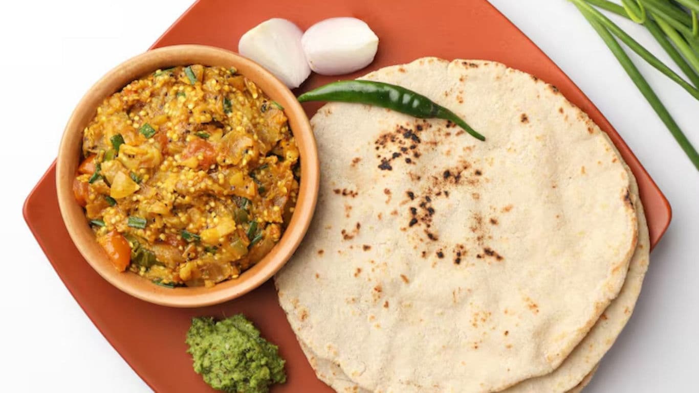 Traditional Indian meal with flatbread and curry