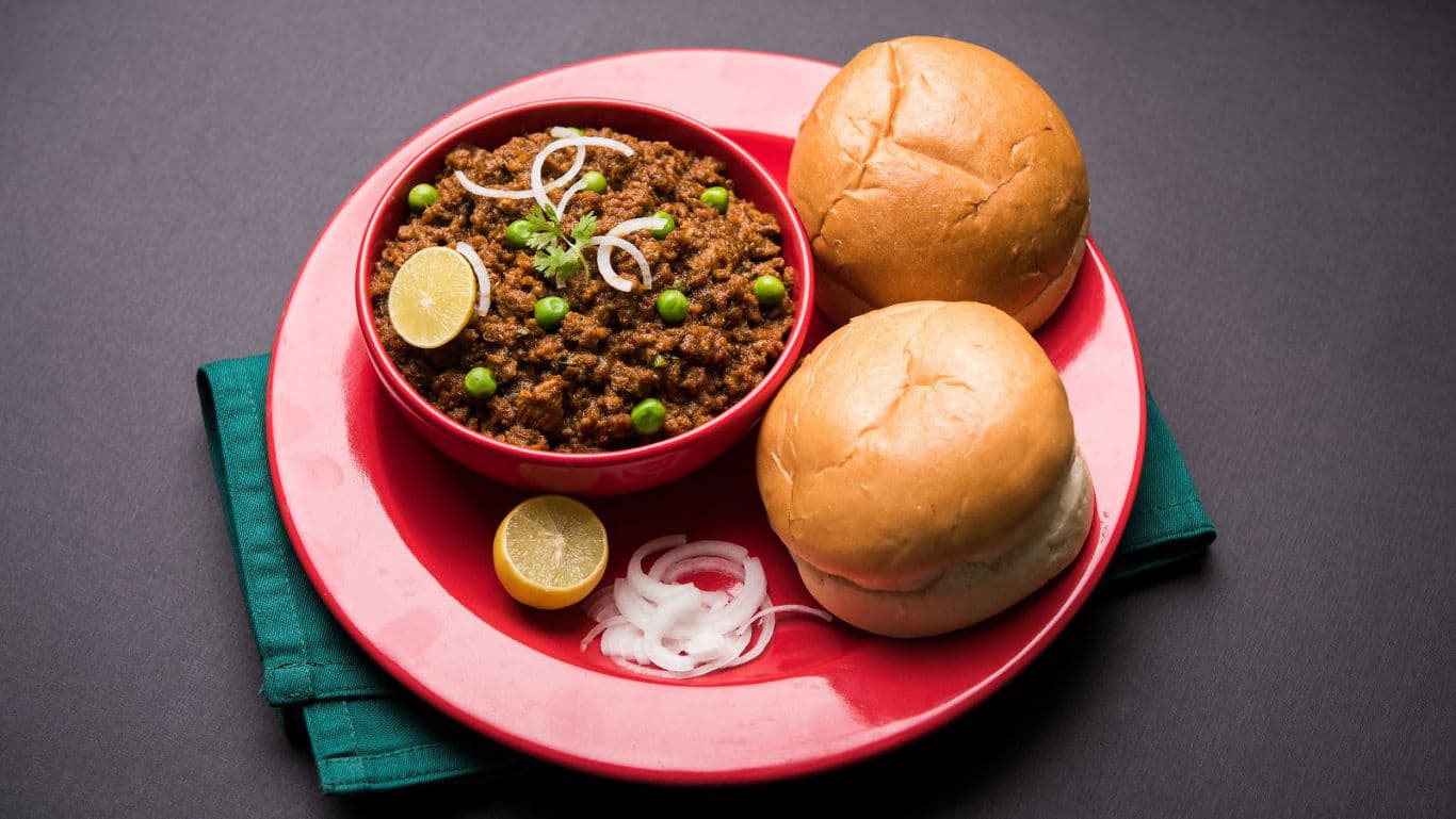 Indian Pav Bhaji with Lemon and Onion Garnish