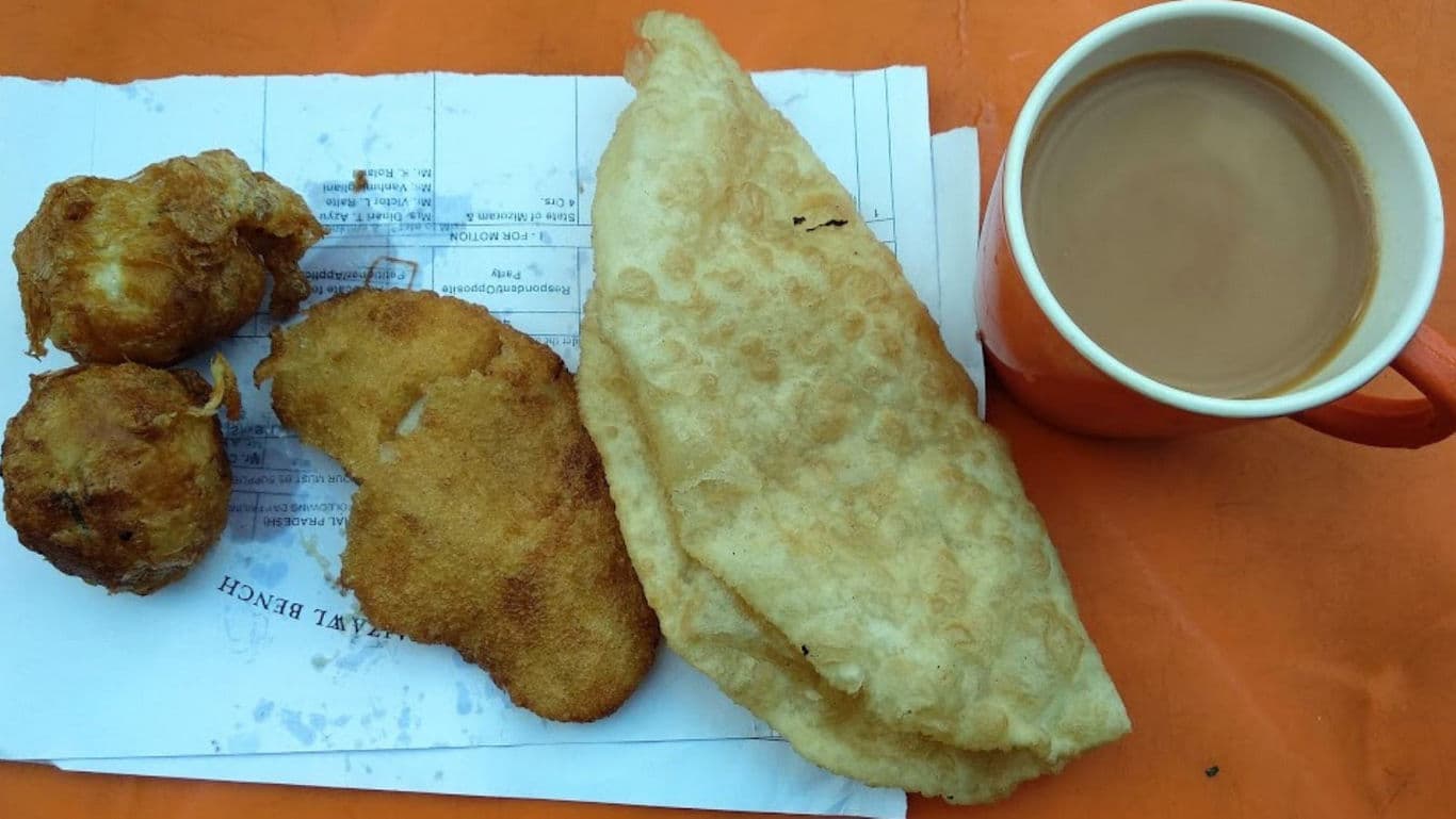 Indian fried snacks with hot tea
