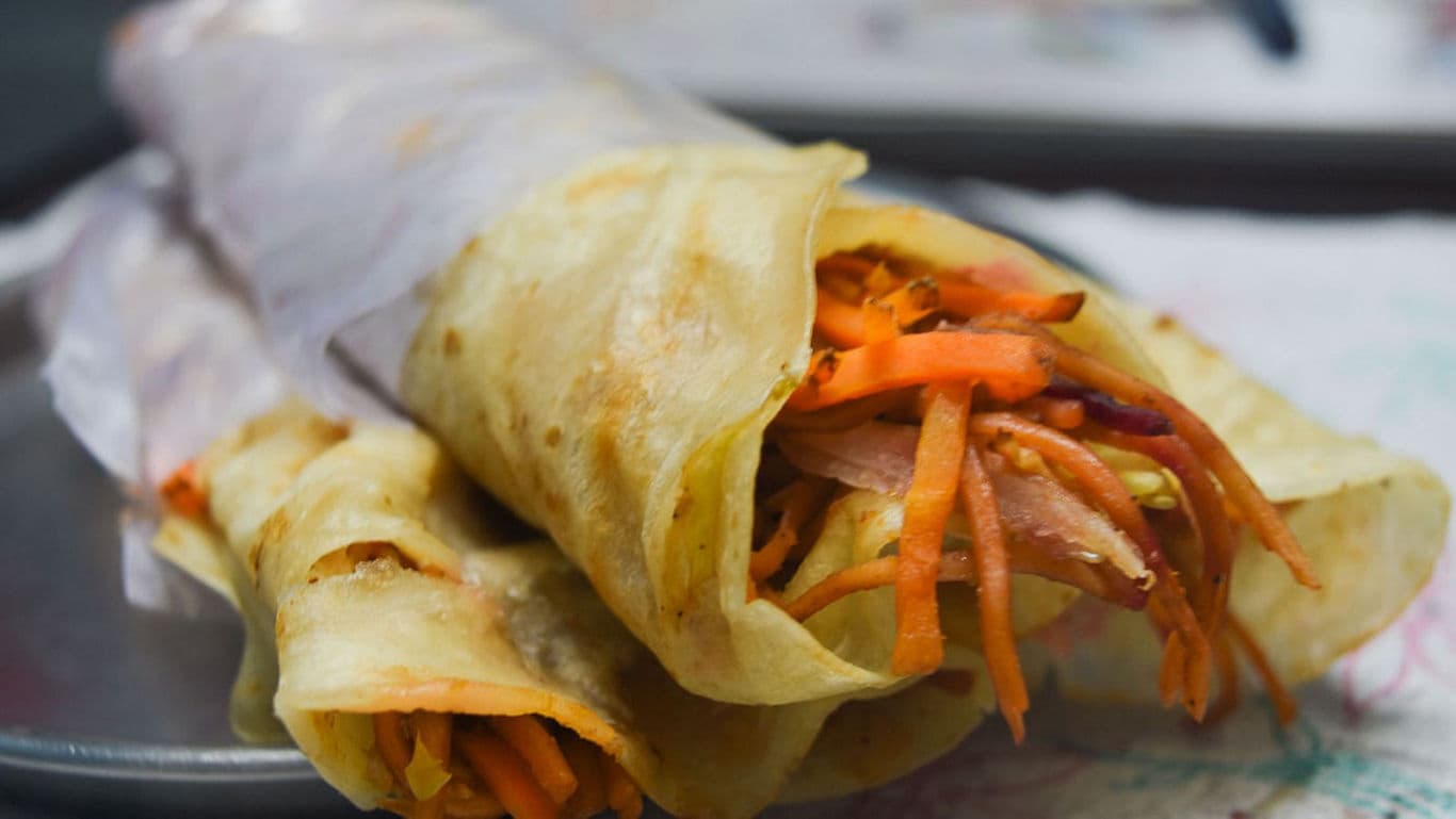 Fresh vegetable wraps on a tray
