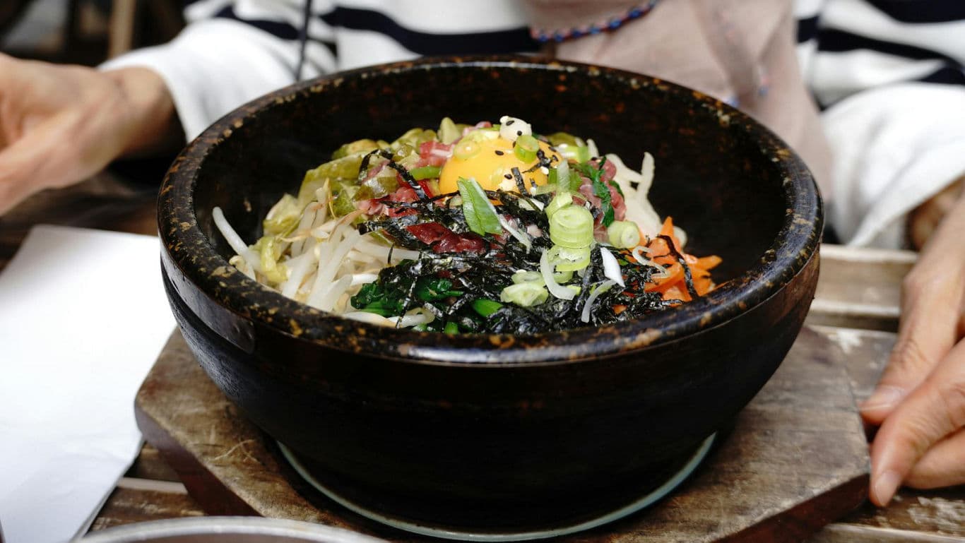 Traditional Korean Bibimbap in Stone Bowl