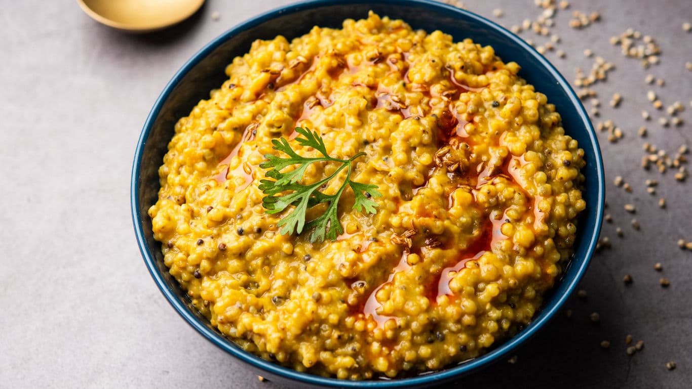 Golden millet porridge with garnish