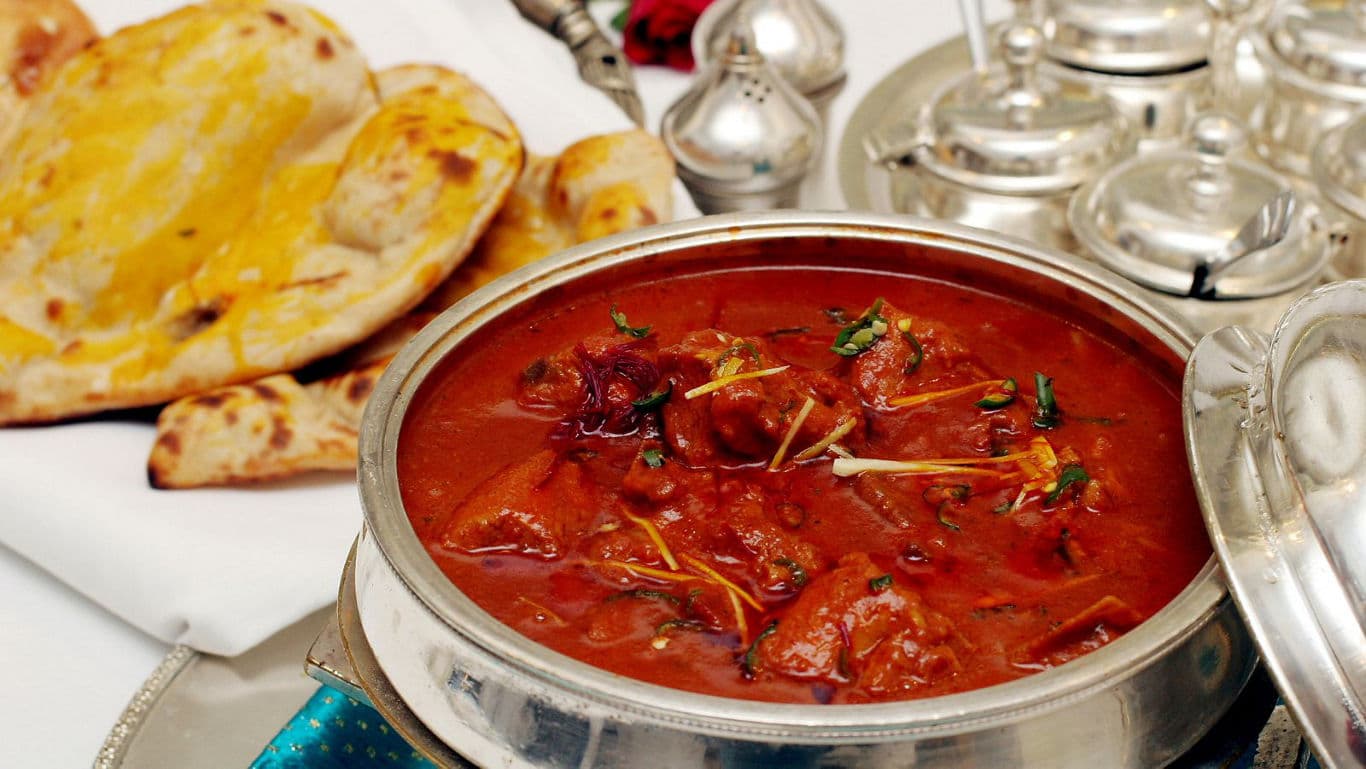 Traditional Indian curry with naan bread