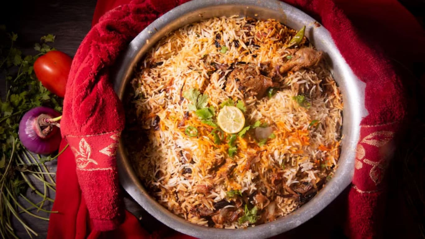 Delicious biryani in a traditional pot