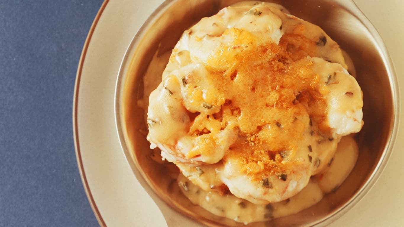 Creamy Shrimp Dish with Orange Garnish