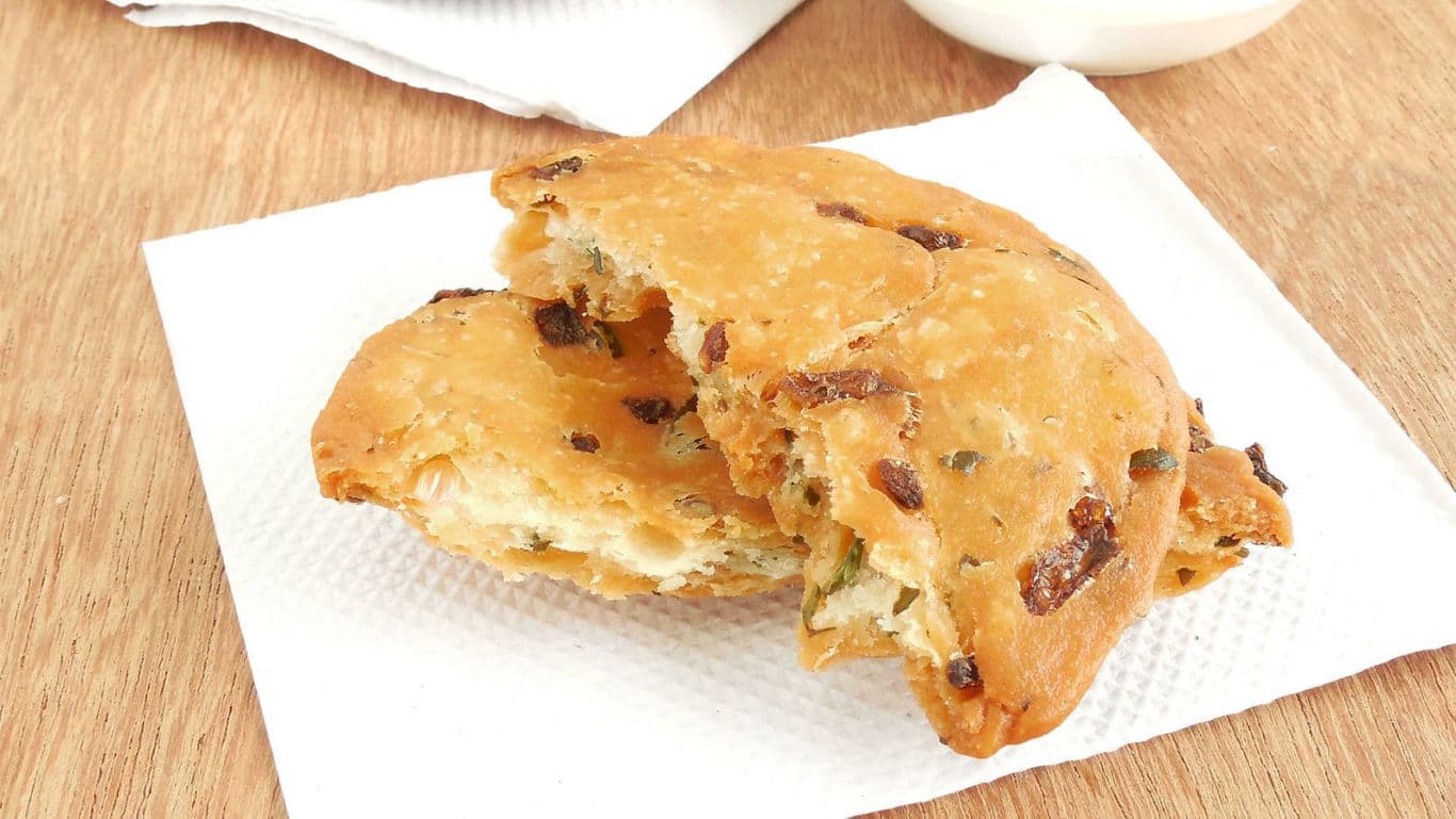 Crispy savory snack on white napkin