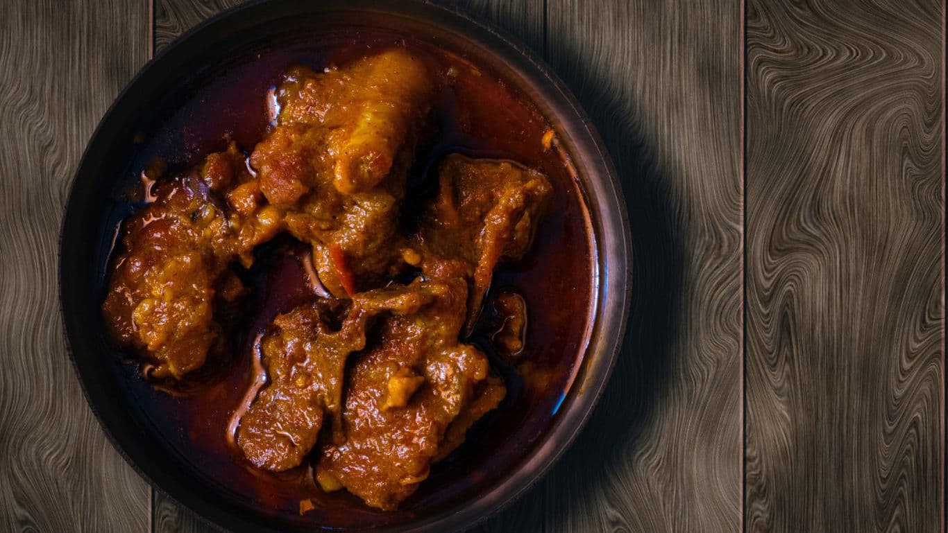 Mutton rezala in its mil, creamy Mughlai gravy